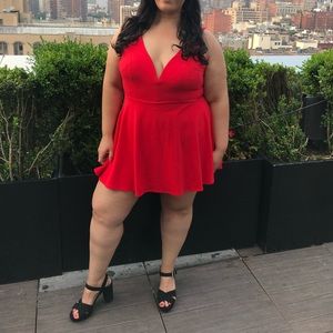 Red low cleavage dress
